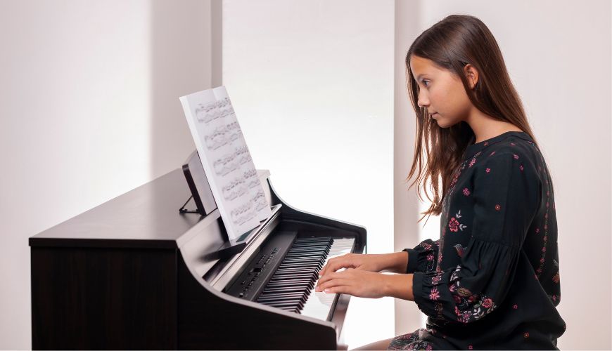 piano student practicing piano